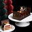 chocolate raspberry buche de noel yule log made by Chez Christophe best cake shop and patisserie in Burnaby and White Rock, near Vancouver, BC