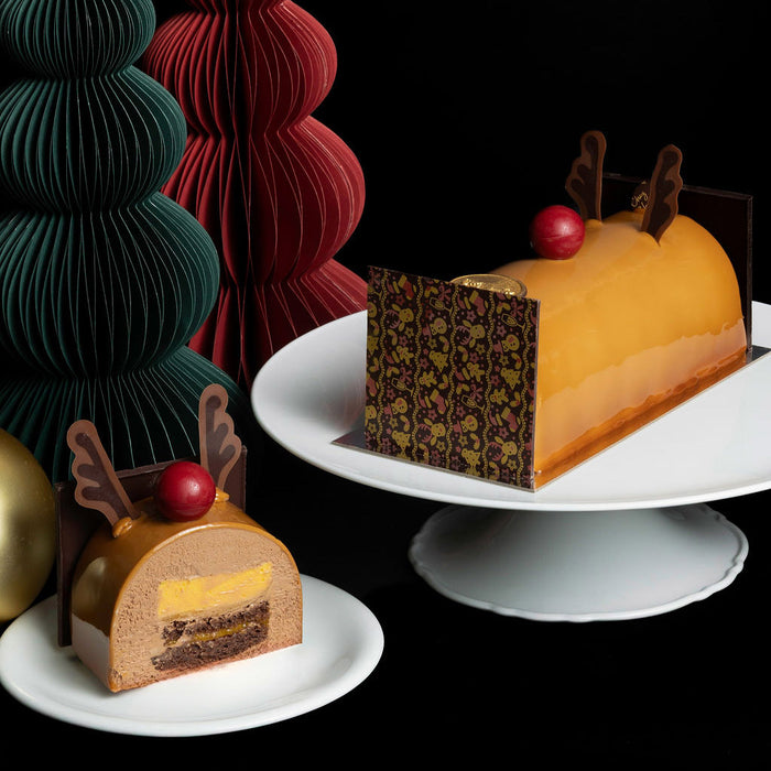 mango chocolate buche de noel yule log made by Chez Christophe artisan cake shop and patisserie in Burnaby and White Rock, near Vancouver, BC