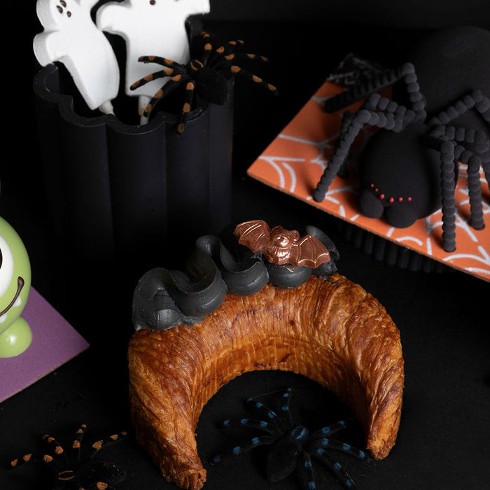 halloween pastries in metro vancouver, bc, moon-shaped croissant chocolate and raspberry flavour from Chez Christophe Patisserie in burnaby, white rock, West Vancouver. 